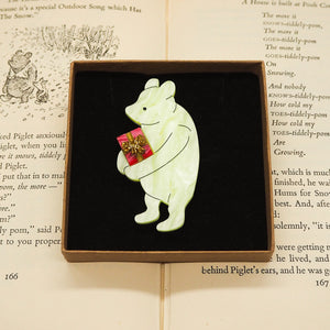 Winnie the Pooh with a Gift Brooch