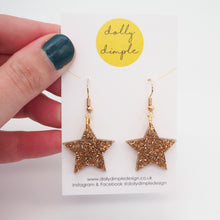 Load image into Gallery viewer, Star Dangle Earrings, Gold Glitter
